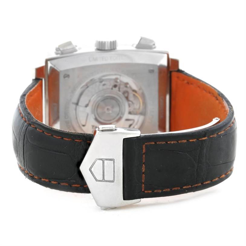 The image shows the back view of the Limited Edition Tag Heuer watch, highlighting its leather strap, clasp, and the watch's exposed movement.