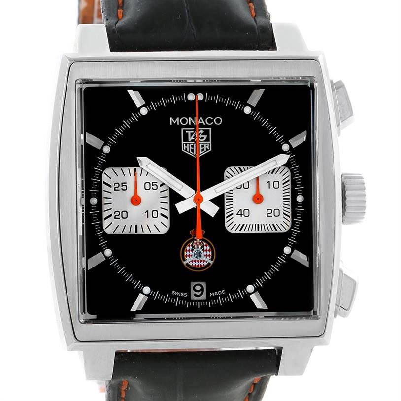 This image shows a frontal view of the Tag Heuer Monaco Limited Edition watch, displaying its black dial, chronograph subdials, and black strap.