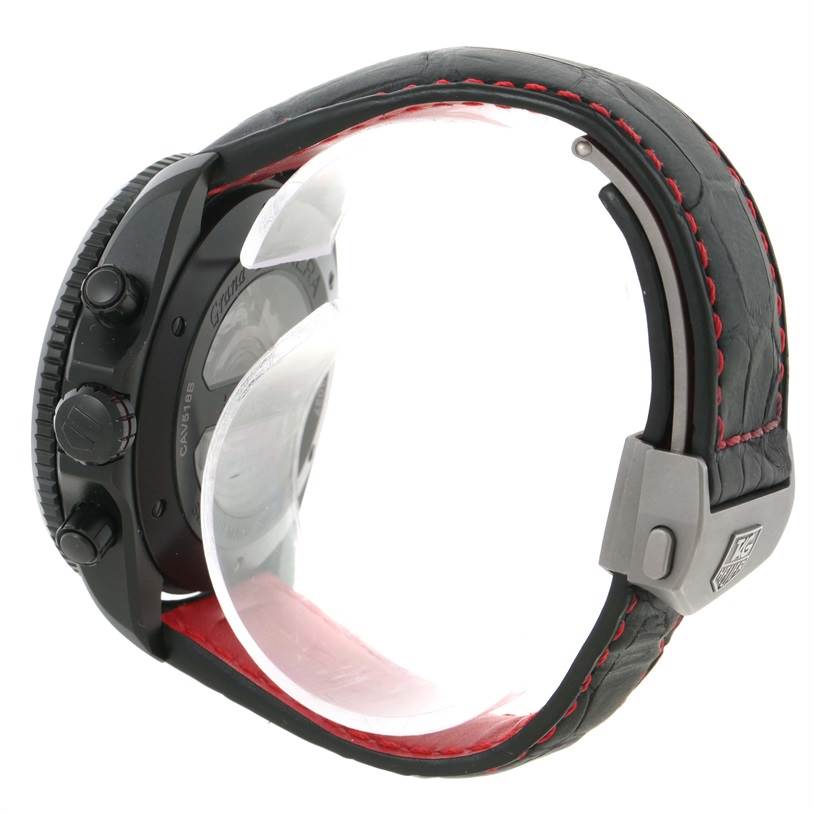 This image shows the side profile of a Tag Heuer Carrera CAV518B.FC6237 Men's Stainless Steel Black Dial CAV518B.FC6237 Men's Stainless Steel Black Dial watch, highlighting its black case, crown and buttons, and leather strap with red stitching.