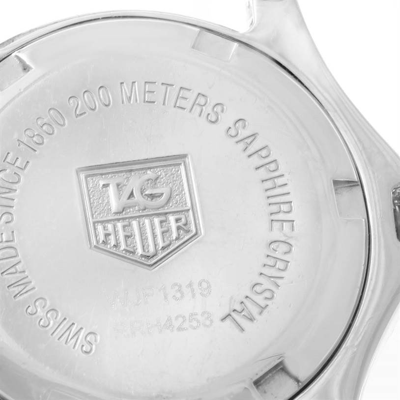 The image shows the back case of the Tag Heuer Link WJF1319.BA0572 Women's Stainless Steel Mother of Pearl Dial WJF1319.BA0572 Women's Stainless Steel Mother of Pearl Dial watch, featuring the brand logo and specifications.