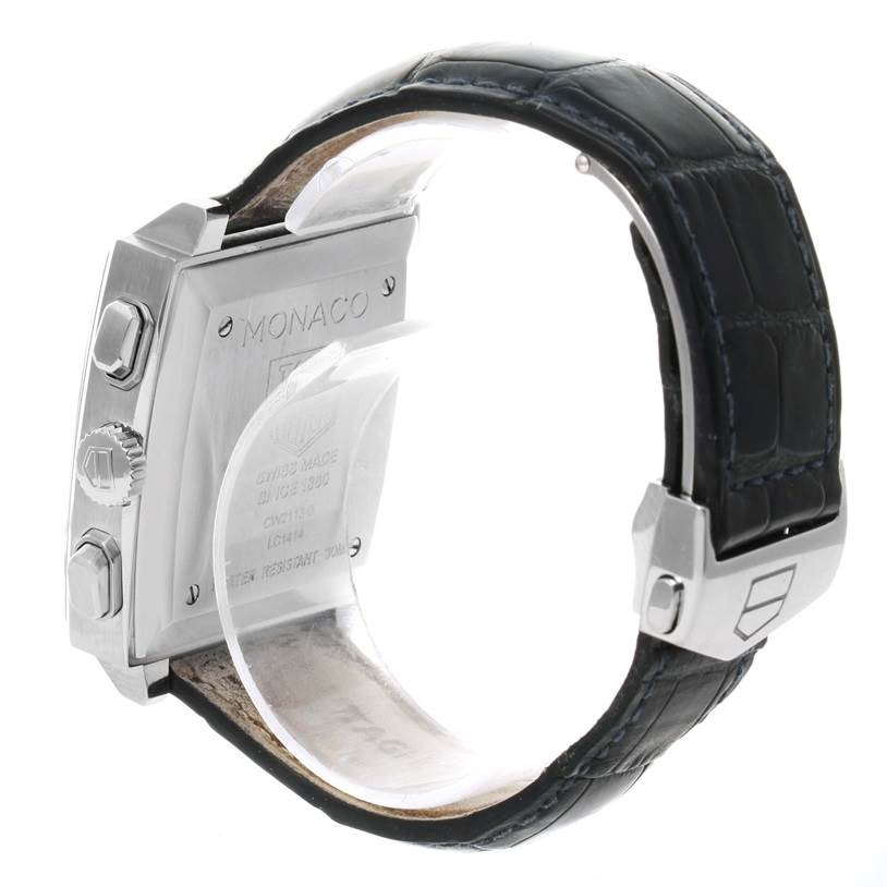 The image shows the side and back of the Tag Heuer Monaco CW2113 Men
s Stainless Steel Blue Dial CW2113 Men
s Stainless Steel Blue Dial watch, focusing on its case, buttons, and leather strap.