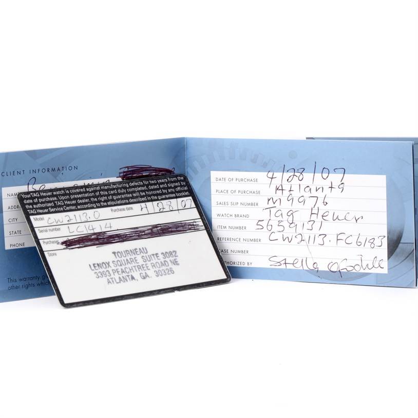 The image shows the warranty card and booklet for a Tag Heuer Monaco CW2113 Men
s Stainless Steel Blue Dial CW2113 Men
s Stainless Steel Blue Dial model watch.