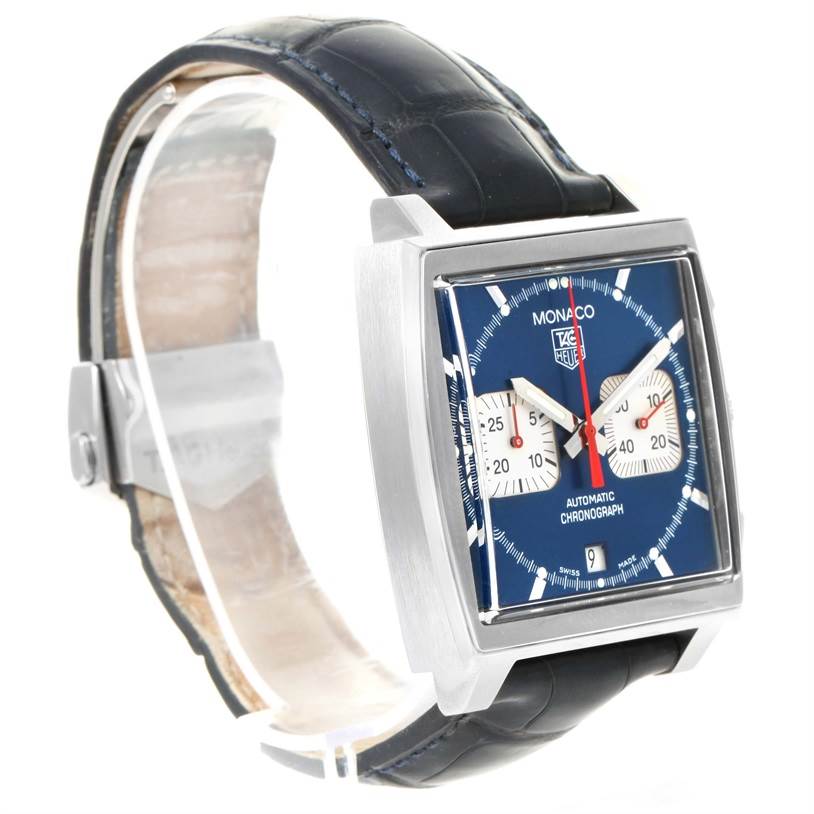 This image shows a Tag Heuer Monaco CW2113 Men
s Stainless Steel Blue Dial CW2113 Men
s Stainless Steel Blue Dial watch from an angled side view, highlighting its square dial, two subdials, and leather strap.