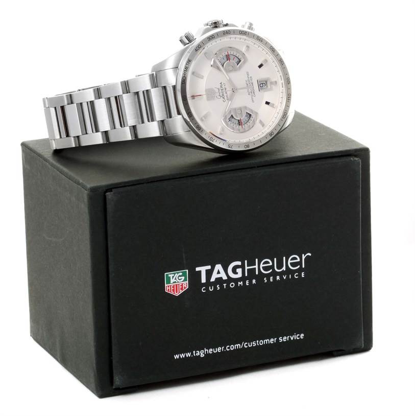 The image shows a Tag Heuer Carrera CAV511B Men's Stainless Steel Silver Dial CAV511B Men's Stainless Steel Silver Dial watch at an oblique angle, resting on a Tag Heuer branded box.