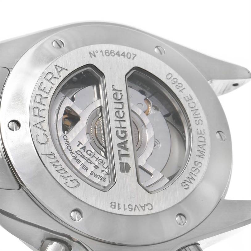 The image shows a close-up of the back case of a Tag Heuer Carrera CAV511B Men's Stainless Steel Silver Dial CAV511B Men's Stainless Steel Silver Dial watch, highlighting the visible movement and engraved details.