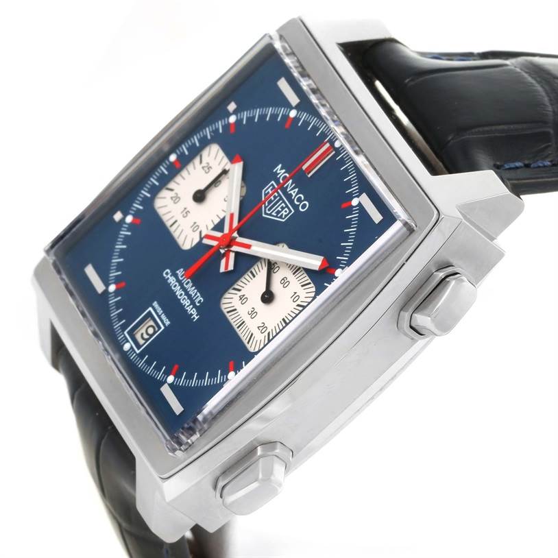 The image shows a side angle of the Tag Heuer Monaco CAW211P Men's Stainless Steel Blue Dial CAW211P Men's Stainless Steel Blue Dial watch, highlighting its crown, pushers, and leather strap.