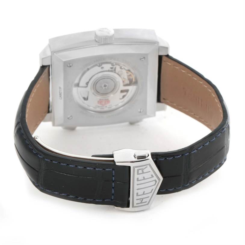 The image shows the back view of the Tag Heuer Monaco CAW211P Men's Stainless Steel Blue Dial CAW211P Men's Stainless Steel Blue Dial watch, highlighting its open case back and leather strap with a buckle.