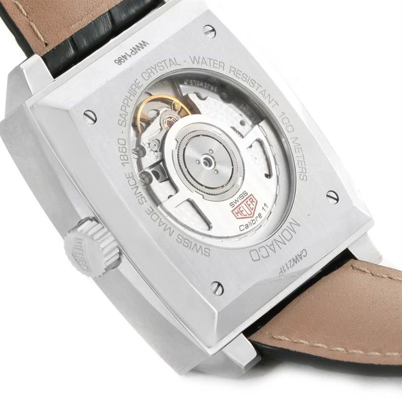 This image shows the back side of the Tag Heuer Monaco CAW211P Men's Stainless Steel Blue Dial CAW211P Men's Stainless Steel Blue Dial watch, exposing its inner mechanism and case details.