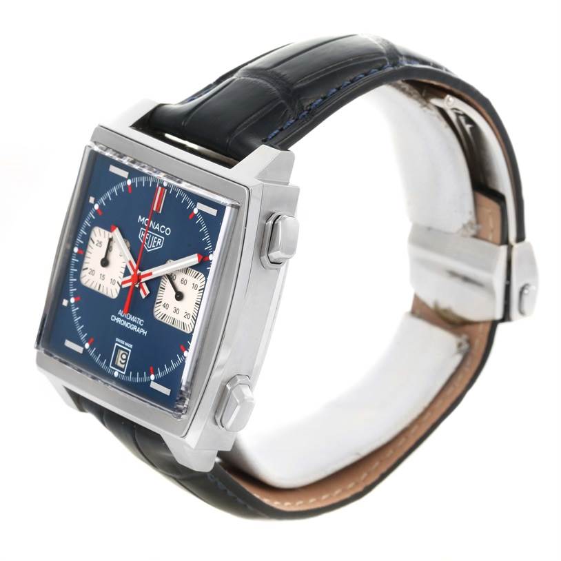 The Tag Heuer Monaco CAW211P Men's Stainless Steel Blue Dial CAW211P Men's Stainless Steel Blue Dial watch is shown at an angle displaying the face, crown, chronograph pushers, and part of the leather strap.