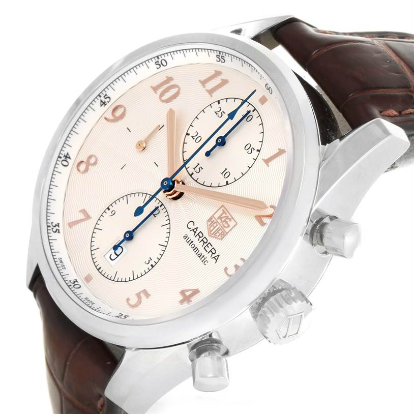 The image shows the face and side view of a Tag Heuer Carrera CAR221A.FC6353 Men
s Stainless Steel Silver Dial CAR221A.FC6353 Men
s Stainless Steel Silver Dial watch, highlighting its dial, crown, and chronograph pushers.