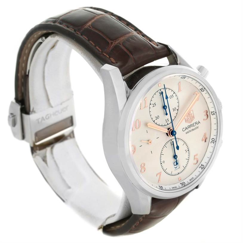 The Tag Heuer Carrera CAR221A.FC6353 Men
s Stainless Steel Silver Dial CAR221A.FC6353 Men
s Stainless Steel Silver Dial watch is shown at a 3/4 angle highlighting its face, case, and leather strap.