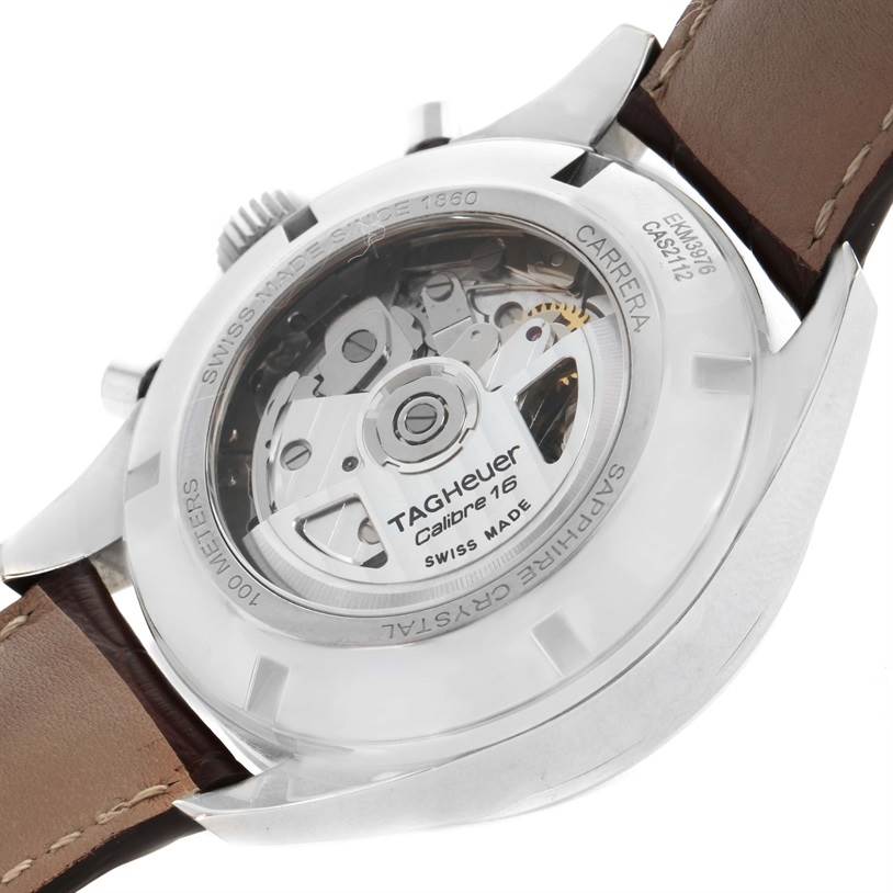 The image shows the back view of a Tag Heuer Carrera CAR221A.FC6353 Men
s Stainless Steel Silver Dial CAR221A.FC6353 Men
s Stainless Steel Silver Dial watch, revealing the inner mechanical movements and the "Calibre 16" label.