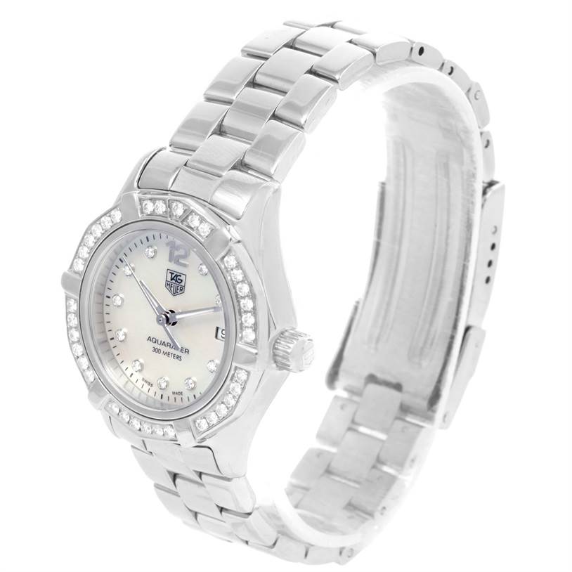 This image shows a side angle of the Tag Heuer Aquaracer WAF1416.BA0824 Women's Stainless Steel Mother of Pearl Dial WAF1416.BA0824 Women's Stainless Steel Mother of Pearl Dial watch, highlighting its dial, bezel with diamonds, and metal bracelet.