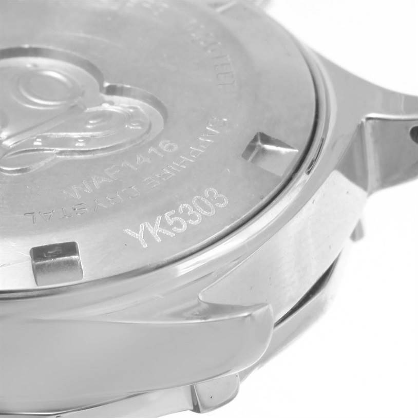 The image shows the back case of a Tag Heuer Aquaracer WAF1416.BA0824 Women's Stainless Steel Mother of Pearl Dial WAF1416.BA0824 Women's Stainless Steel Mother of Pearl Dial watch, highlighting the model number.