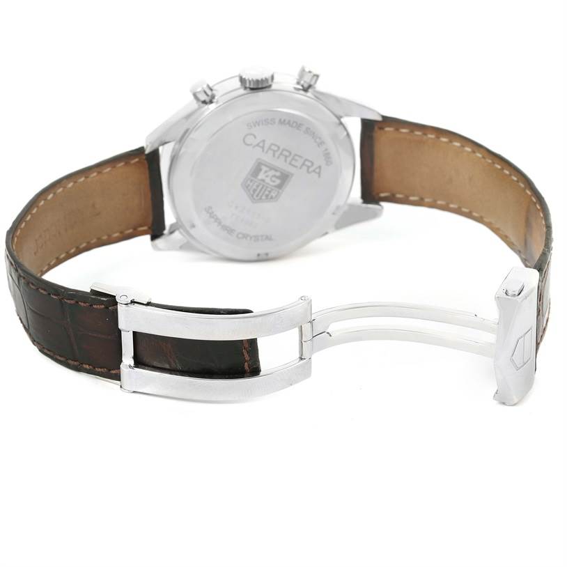 The image shows the back view of the Tag Heuer Carrera CV2111.FC6182 Men's Stainless Steel Black Dial CV2111.FC6182 Men's Stainless Steel Black Dial Classic watch, highlighting the leather strap and deployment clasp.