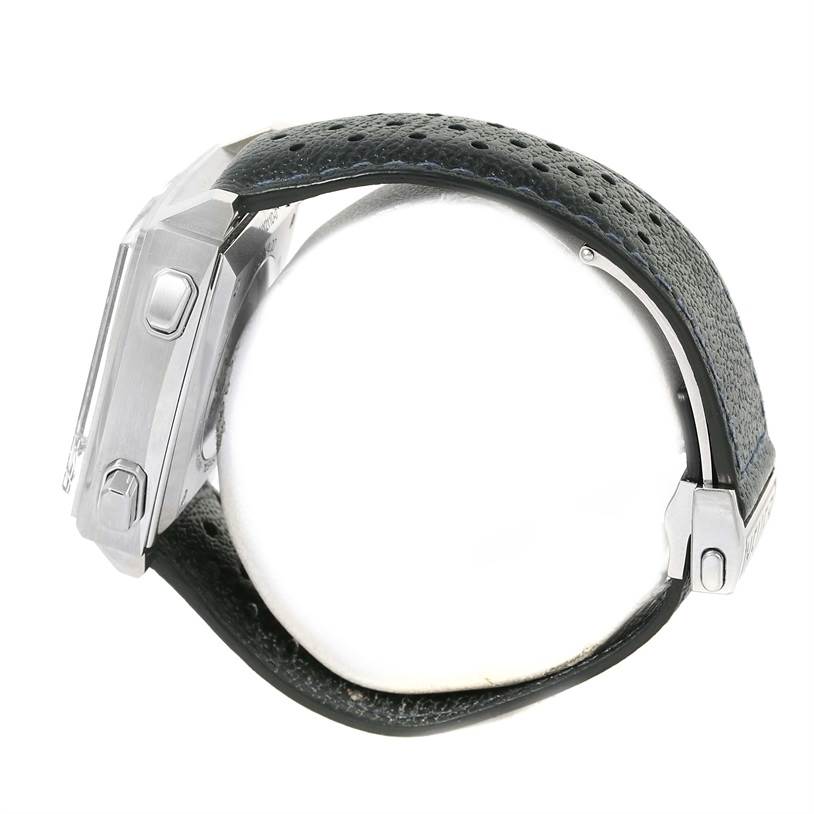 This side view of the Tag Heuer Limited Edition CAW211D Men's Stainless Steel Blue Dial CAW211D Men's Stainless Steel Blue Dial watch shows the case, crown, and perforated leather strap.