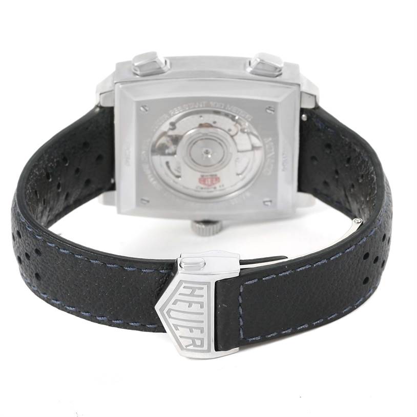 The image shows the back view of the Tag Heuer Limited Edition CAW211D Men's Stainless Steel Blue Dial CAW211D Men's Stainless Steel Blue Dial watch, highlighting the case back and leather strap with the "Heuer" logo.