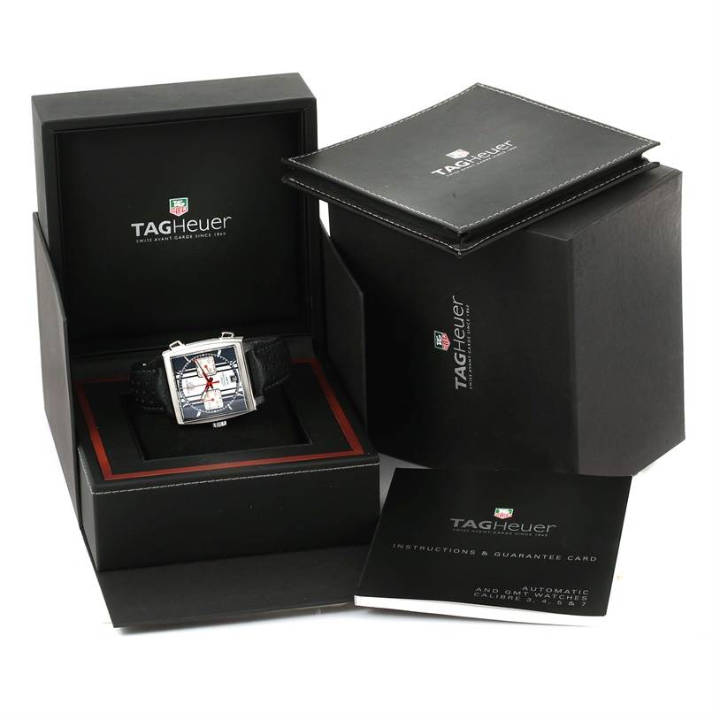 The image shows the Tag Heuer Limited Edition CAW211D Men's Stainless Steel Blue Dial CAW211D Men's Stainless Steel Blue Dial watch, box, user manual, and guarantee card from a front angle.