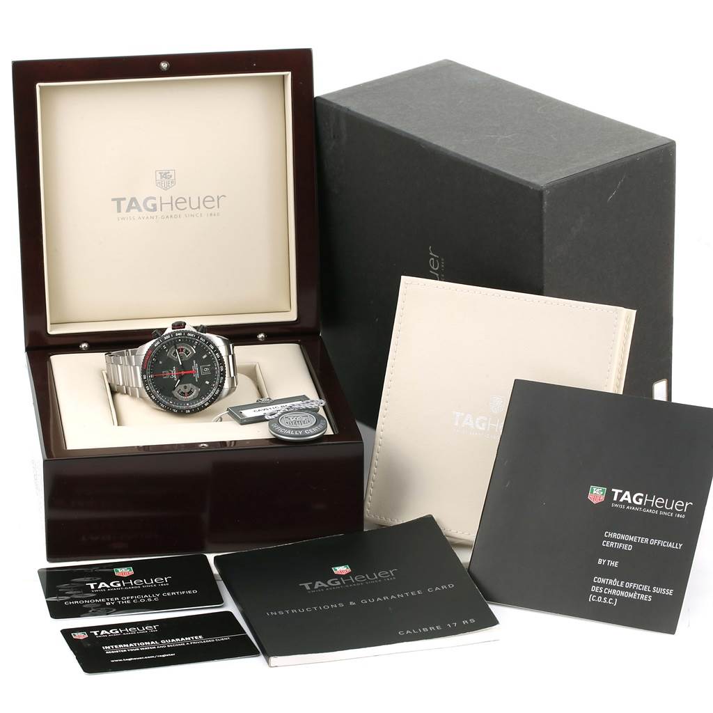 The image shows a Tag Heuer Carrera CAV511C Men's Titanium Black Dial CAV511C Men's Titanium Black Dial watch from a front angle, displayed in its box with accompanying booklets and cards.