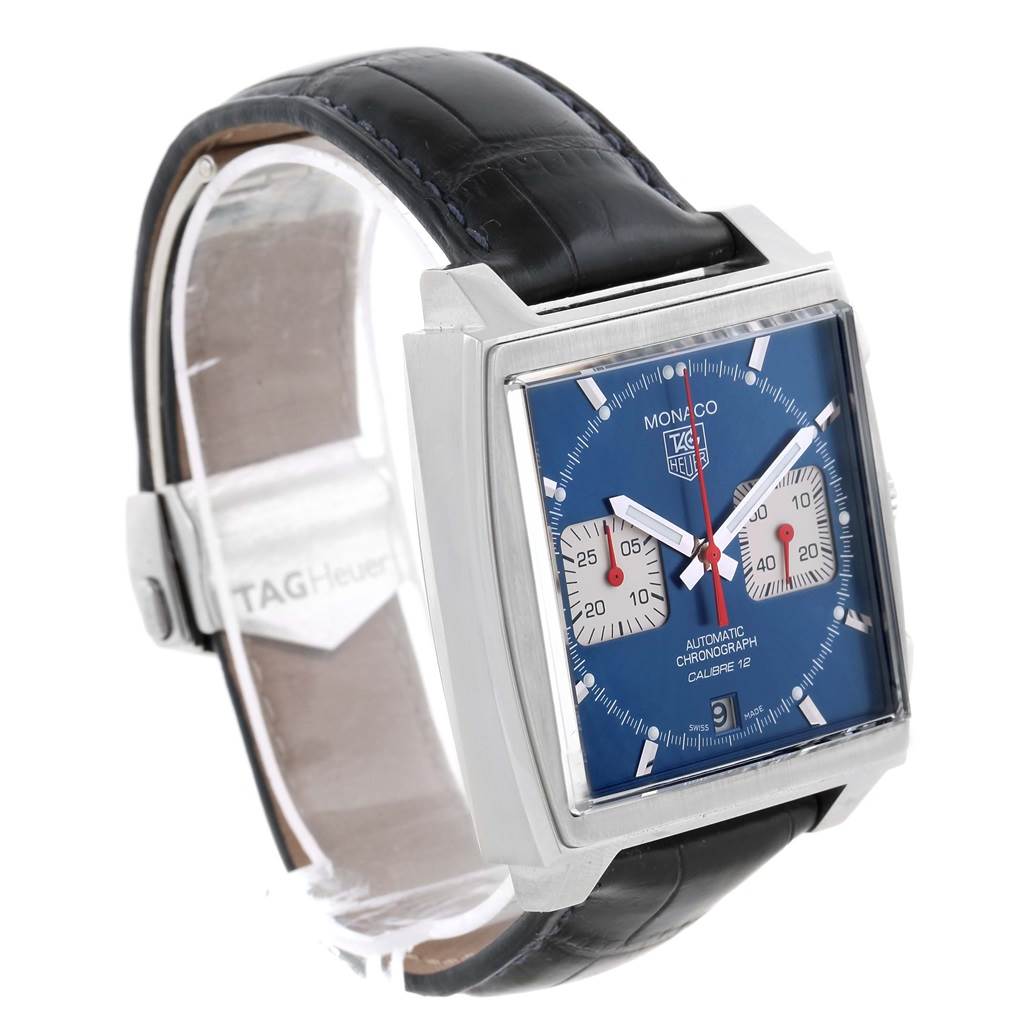 This image shows the Tag Heuer Monaco CAW2111 Men's Stainless Steel Blue Dial CAW2111 Men's Stainless Steel Blue Dial watch from a three-quarter angle, highlighting its square case, blue dial, and leather strap.