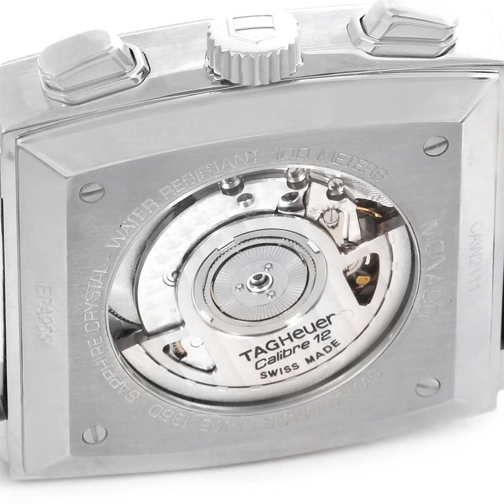 The image shows the back view of a Tag Heuer Monaco CAW2111 Men's Stainless Steel Blue Dial CAW2111 Men's Stainless Steel Blue Dial watch, displaying its Calibre 12 movement.