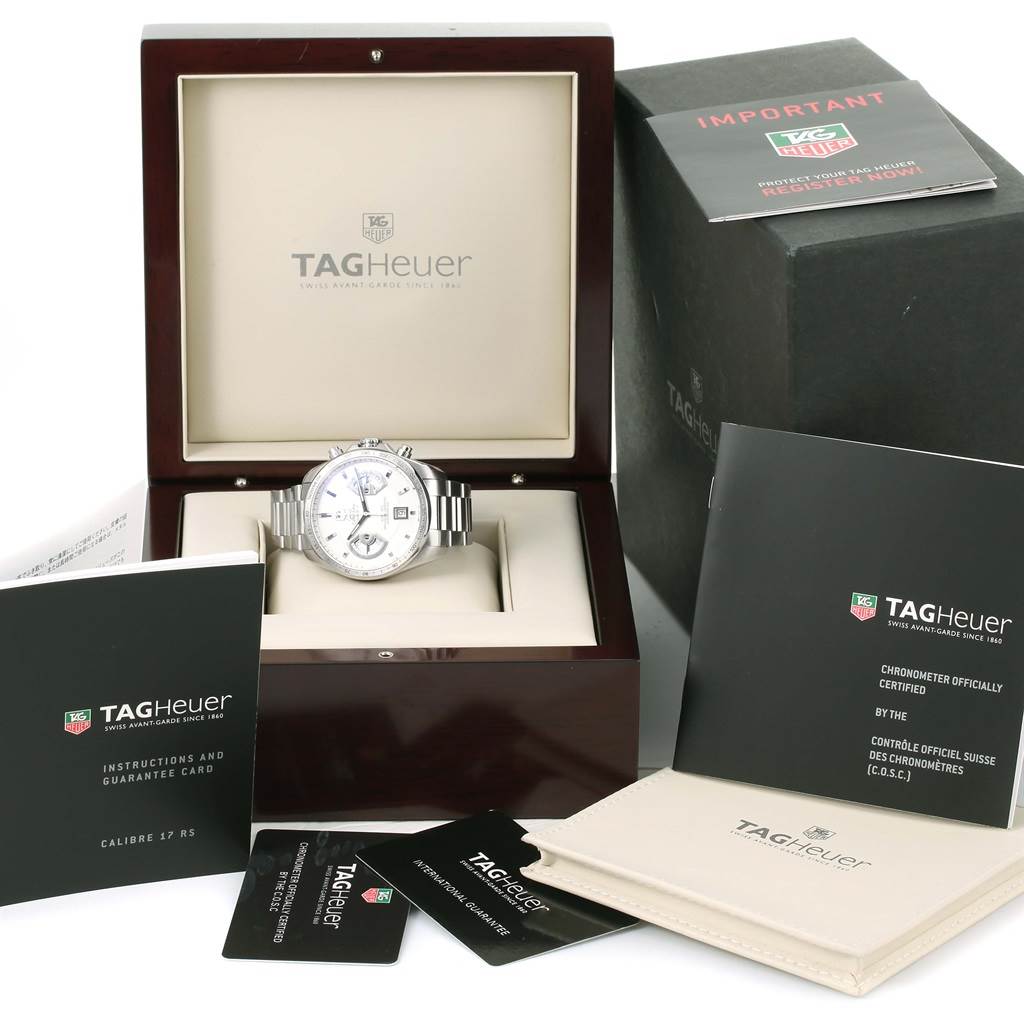 The image shows a Tag Heuer Carrera CAV511B Men's Stainless Steel Silver Dial CAV511B Men's Stainless Steel Silver Dial watch in its opened box, along with its manual, warranty card, and other documentation.