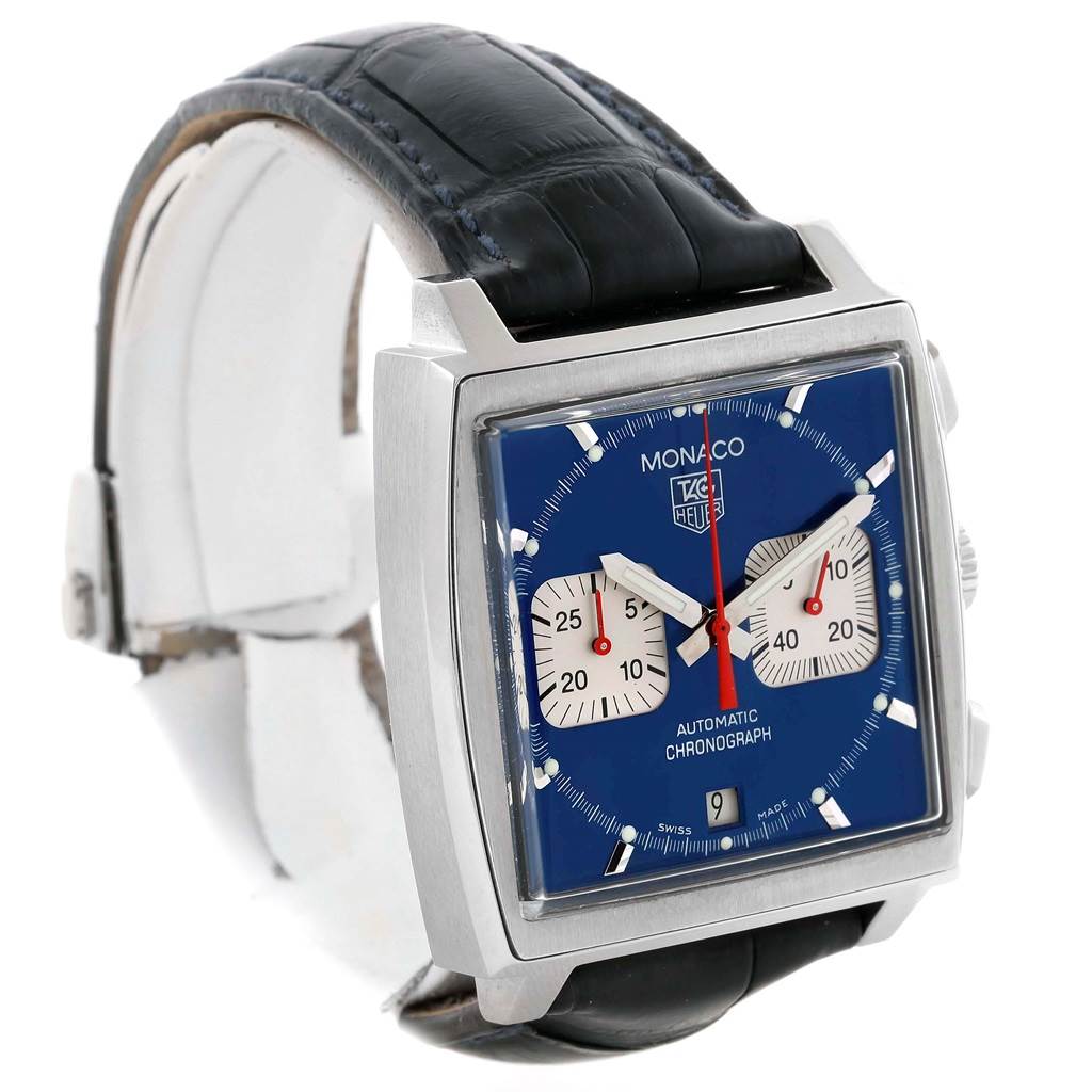 The image shows a Tag Heuer Monaco CW2113 Men's Stainless Steel Blue Dial CW2113 Men's Stainless Steel Blue Dial watch angled to exhibit the face, case, and a portion of the strap.