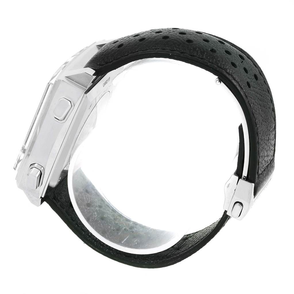 The image shows a side view of a Tag Heuer Monaco CAW211P Men's Stainless Steel Blue Dial CAW211P Men's Stainless Steel Blue Dial watch, focusing on its case, buttons, and perforated leather strap.