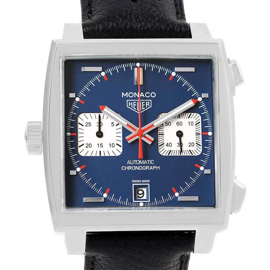 The image shows a front-facing view of the Tag Heuer Monaco watch, displaying the dial, subdials, crown, and strap.