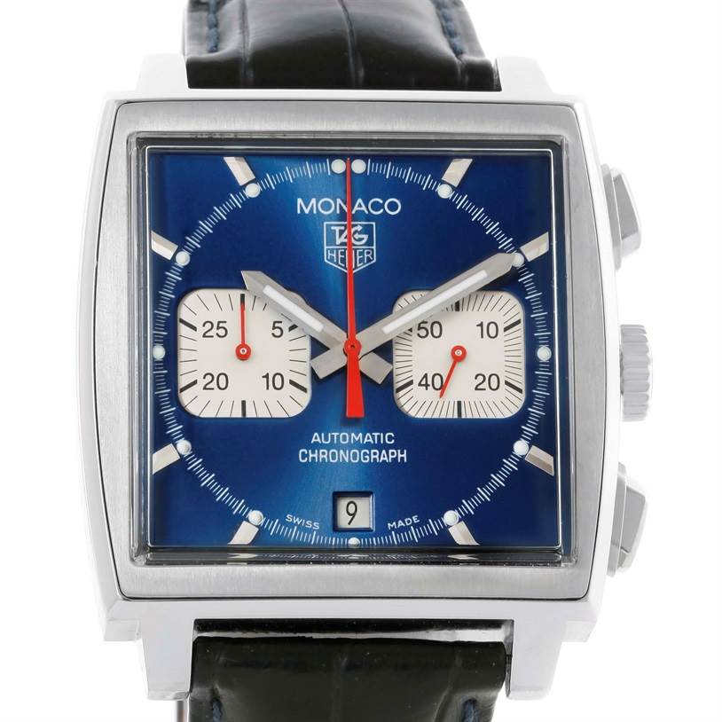 The image shows a close-up of a Tag Heuer Monaco CW2113 Men
s Stainless Steel Blue Dial CW2113 Men
s Stainless Steel Blue Dial watch face with a blue dial and chronograph subdials.