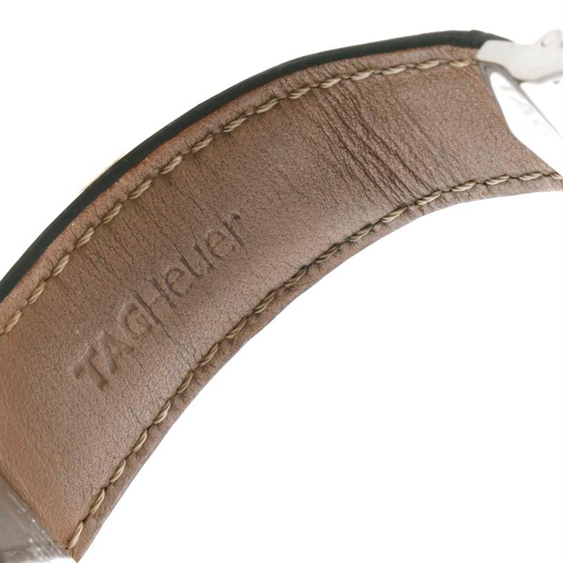 The image shows the inner part of the leather strap of a Tag Heuer Monaco CW2113 Men
s Stainless Steel Blue Dial CW2113 Men
s Stainless Steel Blue Dial watch with the brand name embossed.