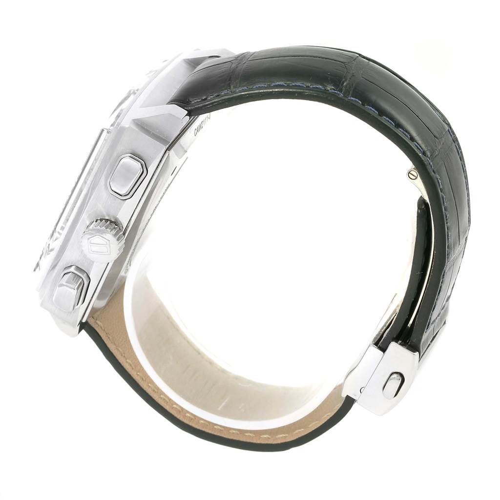 The image shows a side view of a Tag Heuer Monaco CAW2111 Men's Stainless Steel Blue Dial CAW2111 Men's Stainless Steel Blue Dial watch, highlighting its case, buttons, and leather strap.