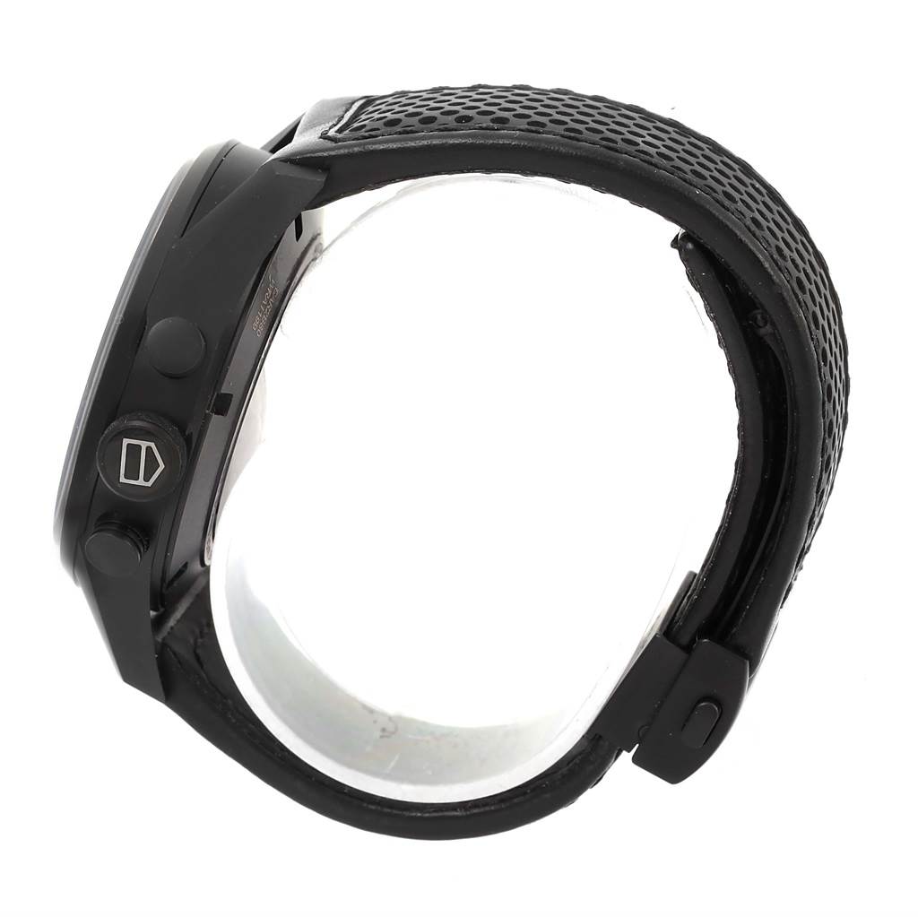 The image shows a side view of a Tag Heuer Carrera CAR2B80.FC6325 Men's Titanium Black Dial CAR2B80.FC6325 Men's Titanium Black Dial watch, focusing on the buttons and a textured black strap.