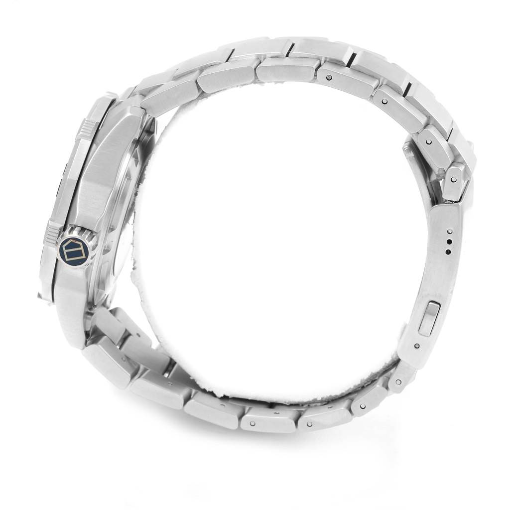 The Tag Heuer Aquaracer RWC2411 Men's Stainless Steel Blue Dial RWC2411 Men's Stainless Steel Blue Dial watch is shown in a side profile angle, highlighting its crown, bezel, and metal bracelet.