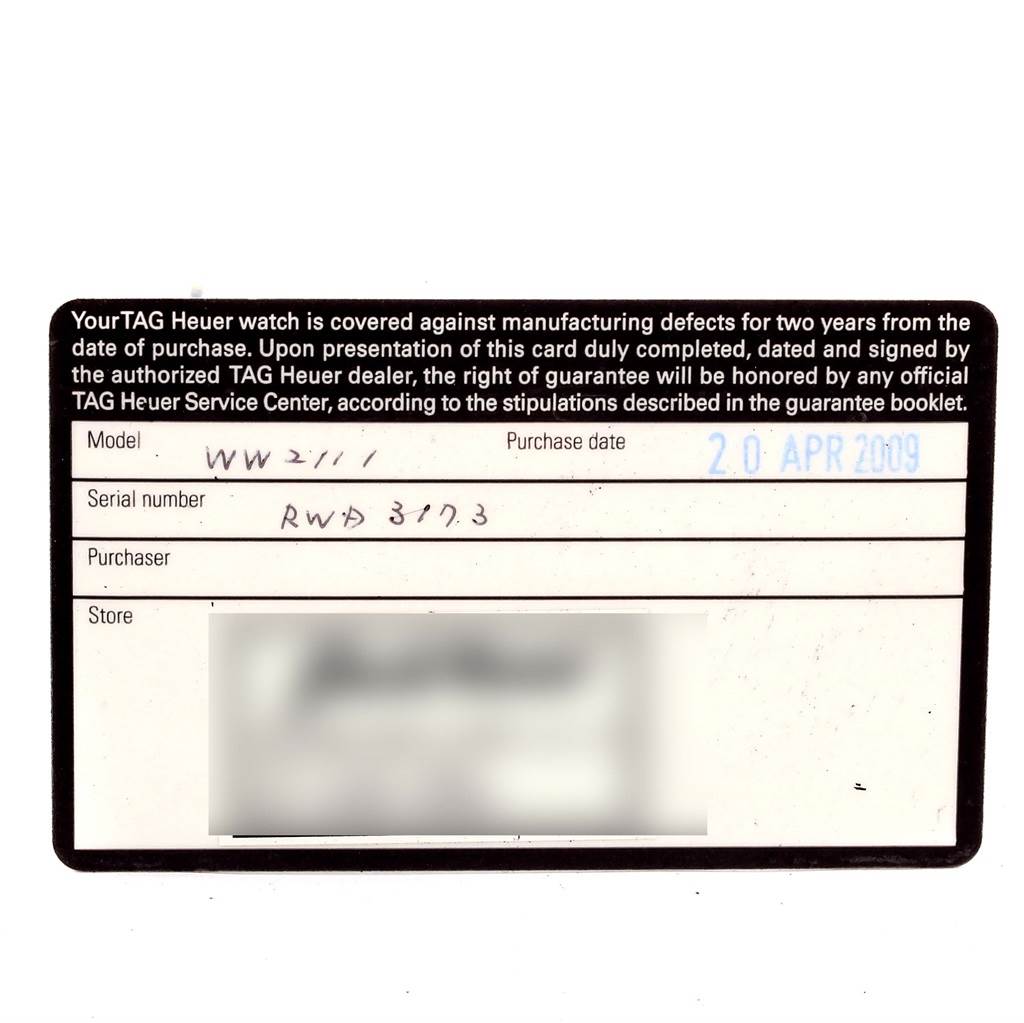 This is a top-view image of a warranty card for a Tag Heuer Monaco WW2111 Men's Stainless Steel Blue Dial WW2111 Men's Stainless Steel Blue Dial watch, showing details like model, serial number, and purchase date.