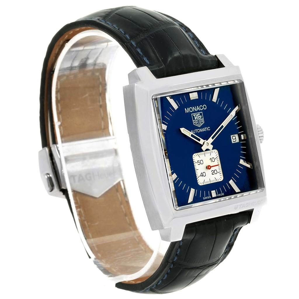 The image displays a side-angle view of the Tag Heuer Monaco WW2111 Men's Stainless Steel Blue Dial WW2111 Men's Stainless Steel Blue Dial watch, showcasing its square face, blue dial, and black leather strap.