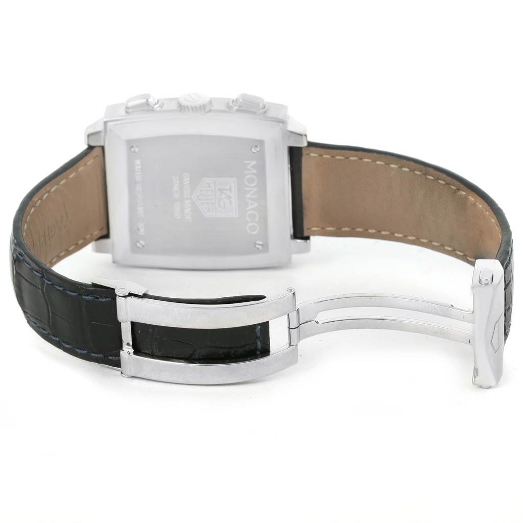 The image shows the back case, buttons, and leather strap with clasp of a Tag Heuer Monaco CW2113 Men
s Stainless Steel Blue Dial CW2113 Men
s Stainless Steel Blue Dial watch from a rear angle.