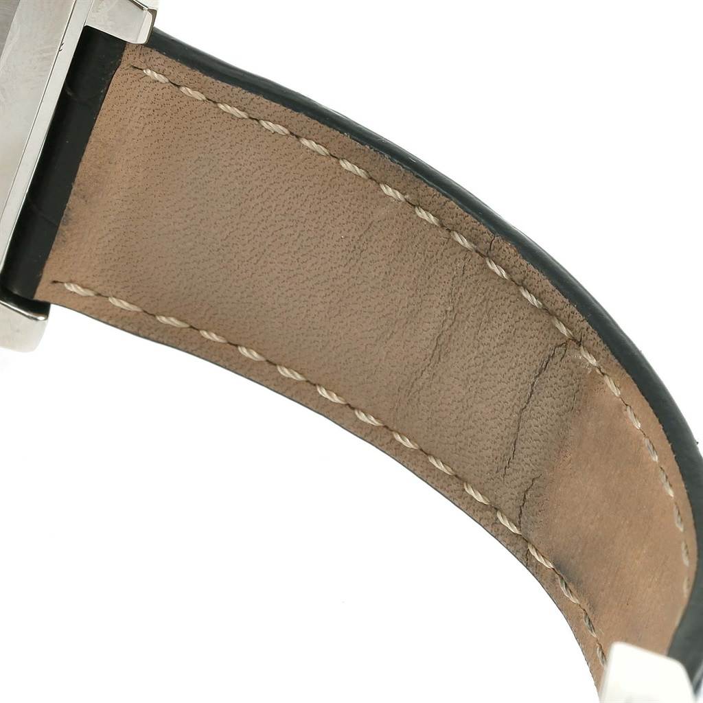 The image shows a close-up of the Tag Heuer Monaco CW2113 Men
s Stainless Steel Blue Dial CW2113 Men
s Stainless Steel Blue Dial watch
s leather strap from the inner side.