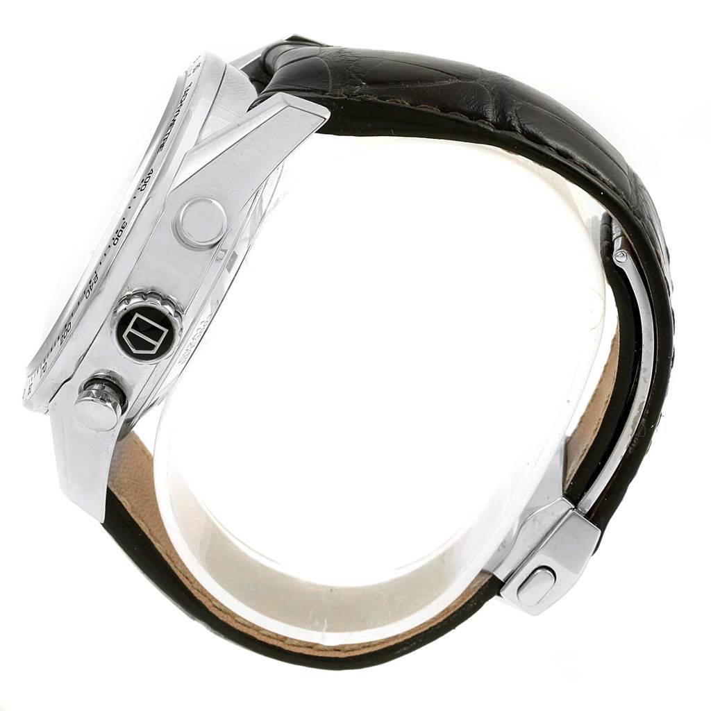 This image shows a side view of the Tag Heuer Carrera CV2A11 Men's Stainless Steel Silver Dial CV2A11 Men's Stainless Steel Silver Dial watch, highlighting the crown, pushers, and part of the leather strap.