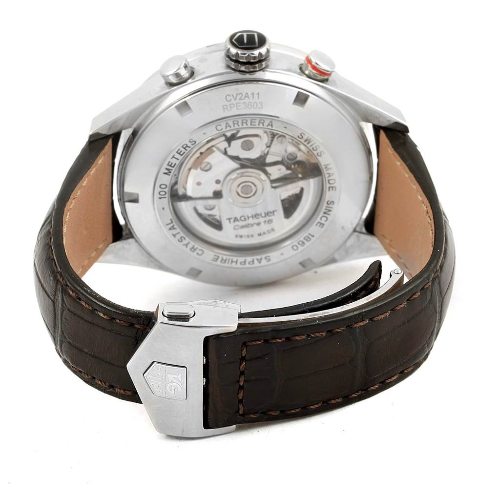 The image shows the back side of a Tag Heuer Carrera CV2A11 Men's Stainless Steel Silver Dial CV2A11 Men's Stainless Steel Silver Dial model watch, highlighting the movement, case back, and leather strap.