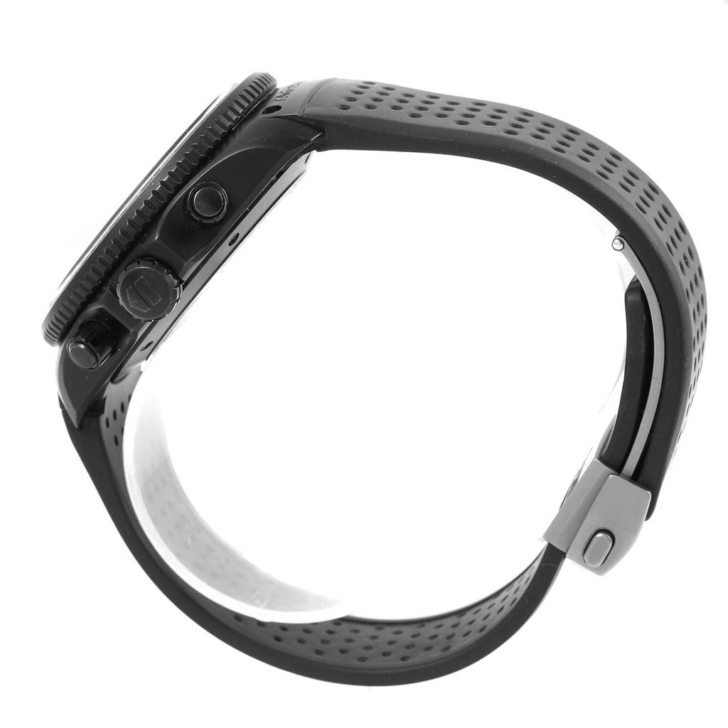 The image shows a side view of the Tag Heuer Carrera CAV518B.FT6016 Men's Stainless Steel Black Dial CAV518B.FT6016 Men's Stainless Steel Black Dial model watch, displaying the black case, strap, and the chronograph pushers.