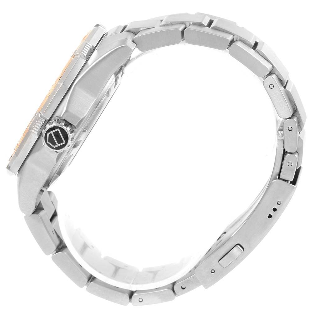 The image shows a side view of a Tag Heuer Aquaracer WAJ2150 Men's Stainless Steel Black Dial WAJ2150 Men's Stainless Steel Black Dial watch, highlighting the case, crown, and bracelet links.