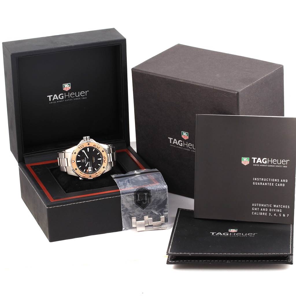The image shows a Tag Heuer Aquaracer WAJ2150 Men's Stainless Steel Black Dial WAJ2150 Men's Stainless Steel Black Dial watch in its box with manuals, extra links, and packaging.