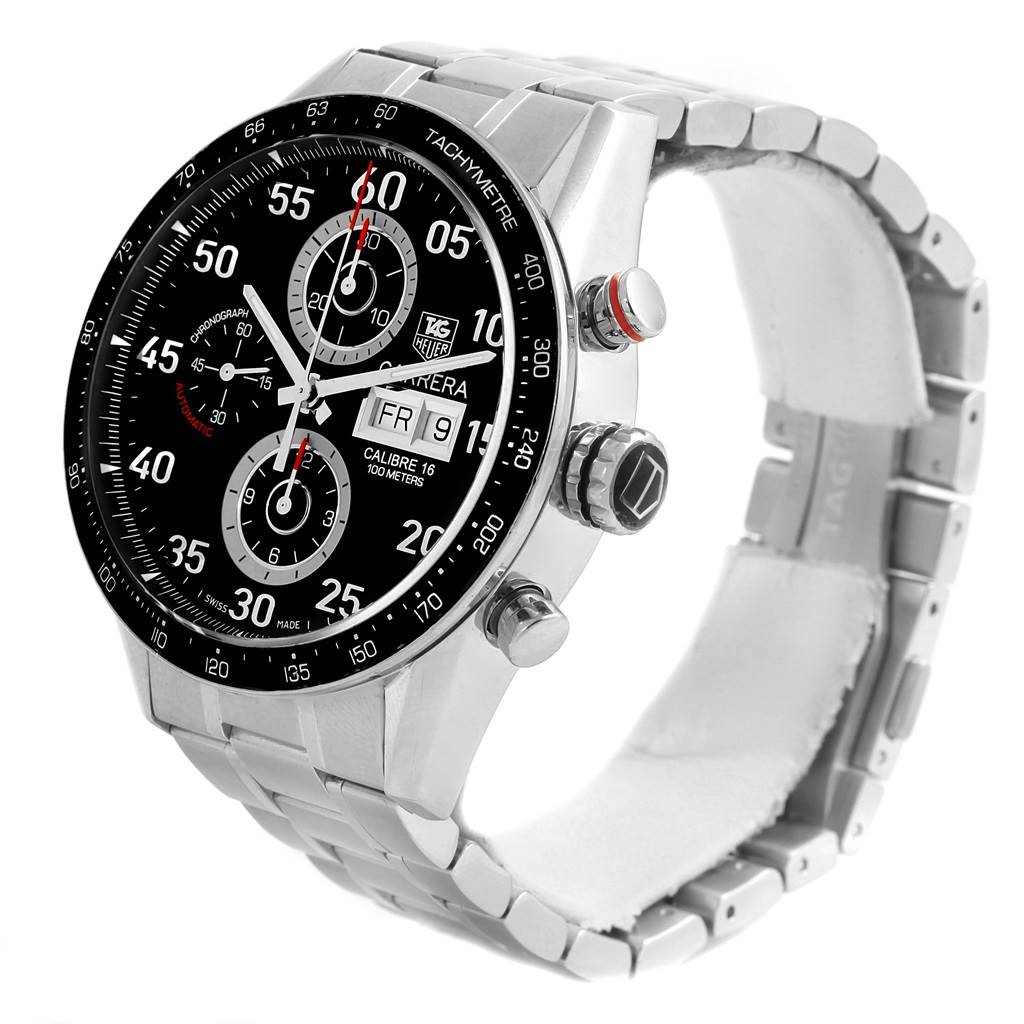 The image shows a Tag Heuer Carrera CV2A10.BA0796 Men's Stainless Steel Black Dial CV2A10.BA0796 Men's Stainless Steel Black Dial watch at a three-quarter angle, highlighting its face, tachymeter, and stainless steel band.