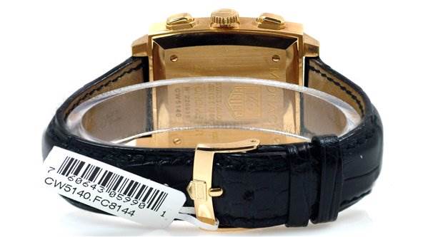 This Tag Heuer Monaco CW5140 Men's Yellow Gold Silver Dial CW5140 Men's Yellow Gold Silver Dial watch image shows the back case and leather strap with a visible tag.