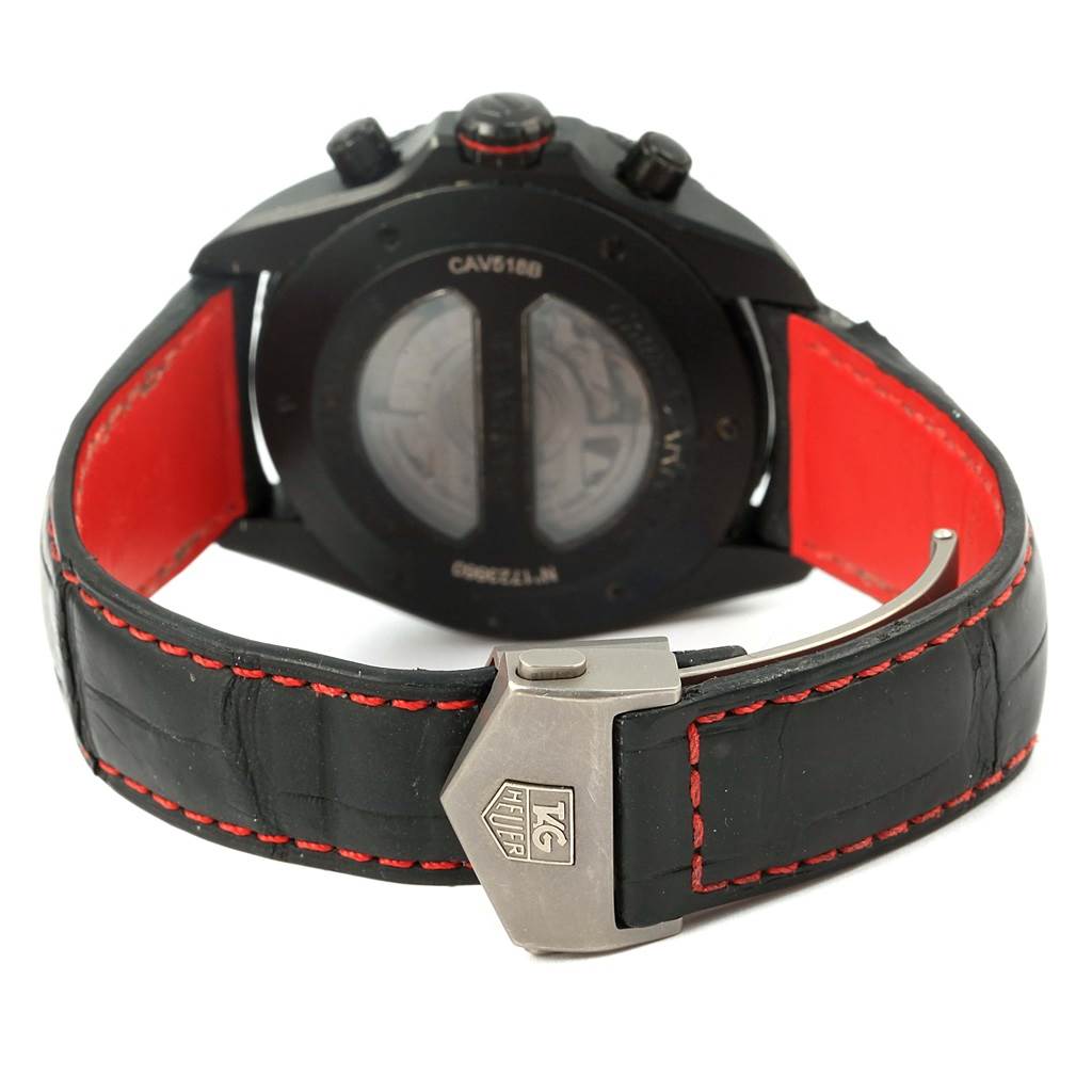 The image shows the back view of a Tag Heuer Carrera CAV518B.FT6016 Men's Stainless Steel Black Dial CAV518B.FT6016 Men's Stainless Steel Black Dial watch, highlighting the strap with red lining and the clasp featuring the brand's logo.