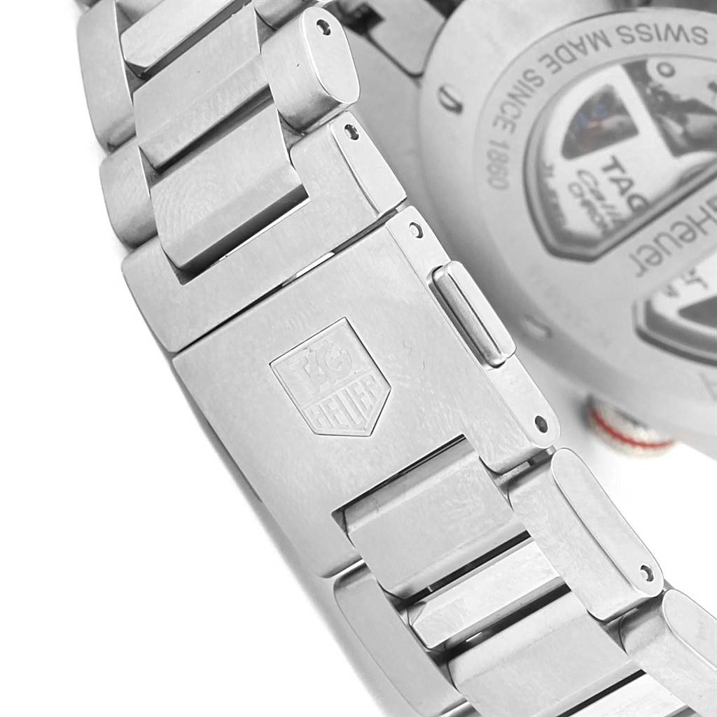 The image shows the clasp and part of the bracelet of a Tag Heuer Carrera CAV5115 Men's Stainless Steel Black Dial CAV5115 Men's Stainless Steel Black Dial watch, featuring the brand's logo.