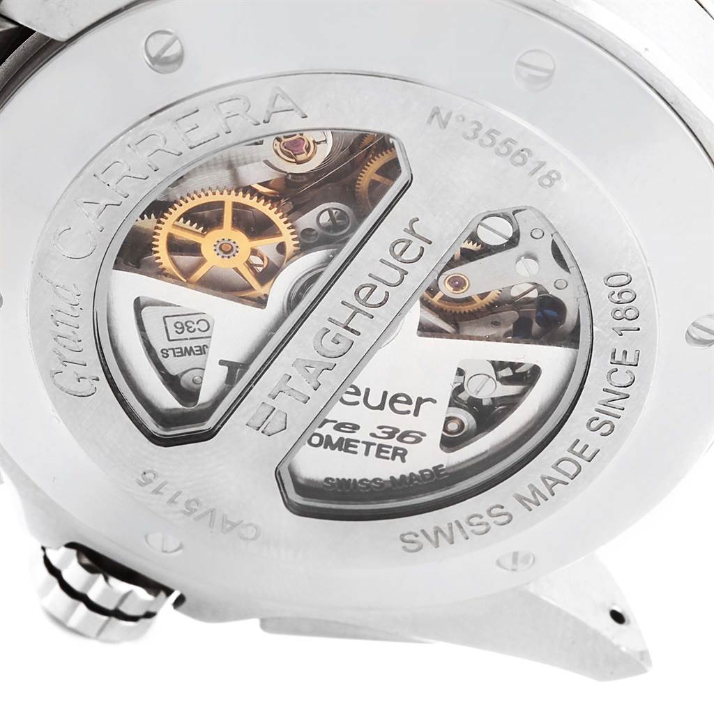 The image shows the back of a Tag Heuer Carrera CAV5115 Men's Stainless Steel Black Dial CAV5115 Men's Stainless Steel Black Dial watch, displaying its internal gears through a transparent case back.