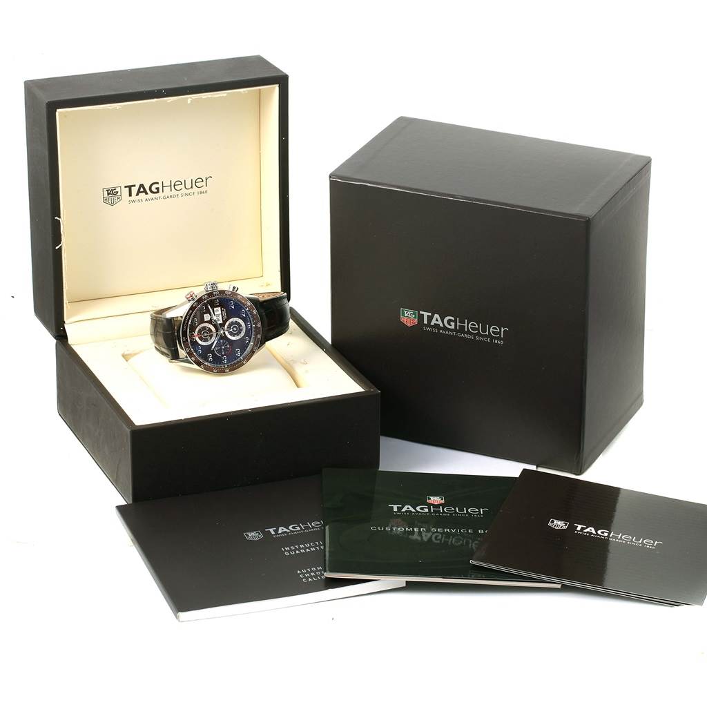 The image shows a Tag Heuer Carrera CV2A12.FC6236 Men's Stainless Steel Brown Dial CV2A12.FC6236 Men's Stainless Steel Brown Dial watch inside its opened display box, along with its outer box and accompanying booklets.
