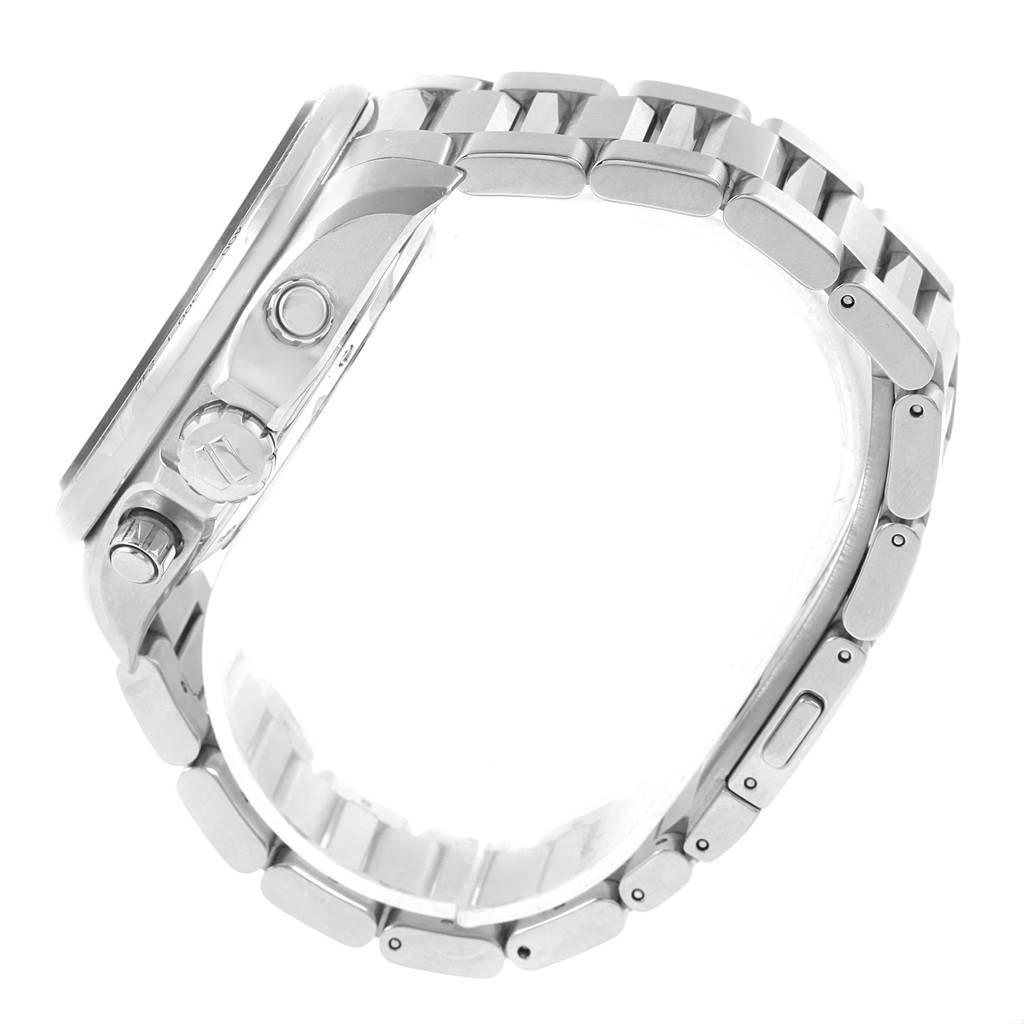 The image shows a side view of the Tag Heuer Carrera CAV511A Men's Stainless Steel Black Dial CAV511A Men's Stainless Steel Black Dial watch, highlighting the crown, pushers, and metal bracelet.